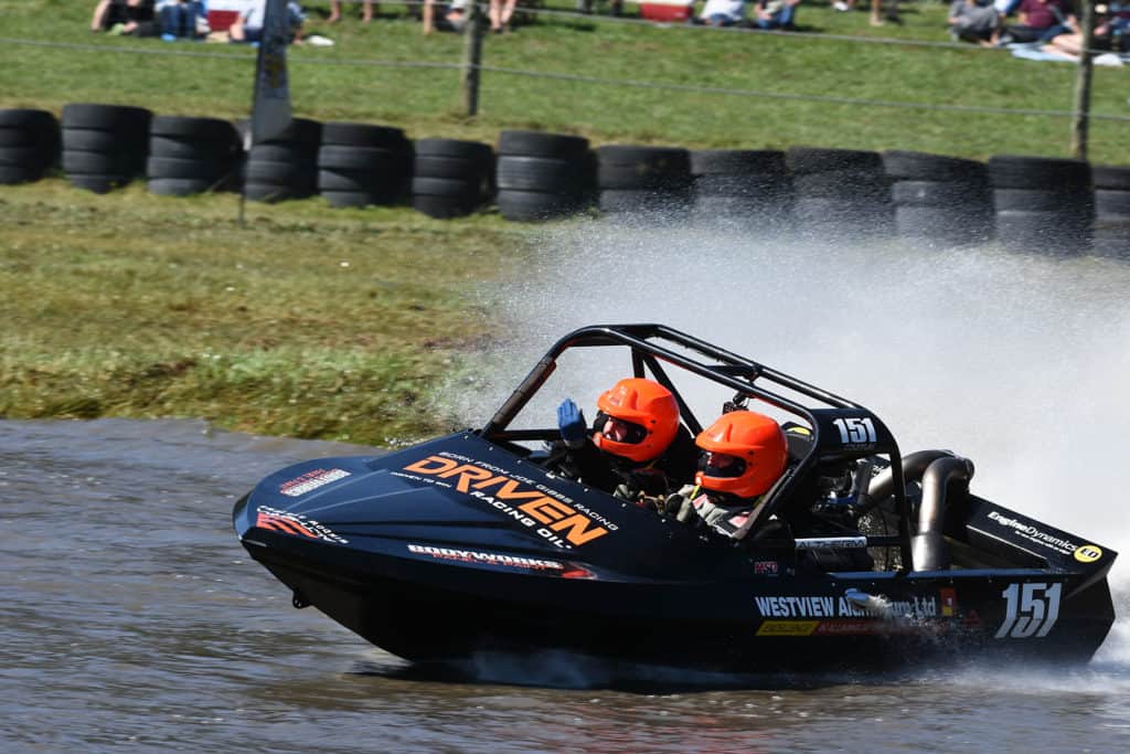 jet sprint racer putting Sprintec jet boat through its paces